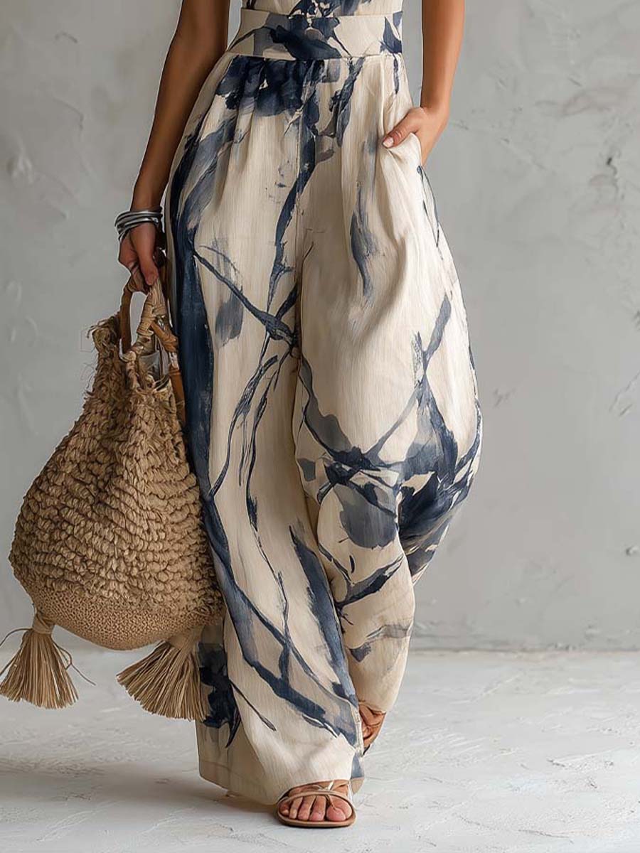 Lila | Tuta ampia e fluida con spalline, stampa artistica effetto inchiostro e tasche